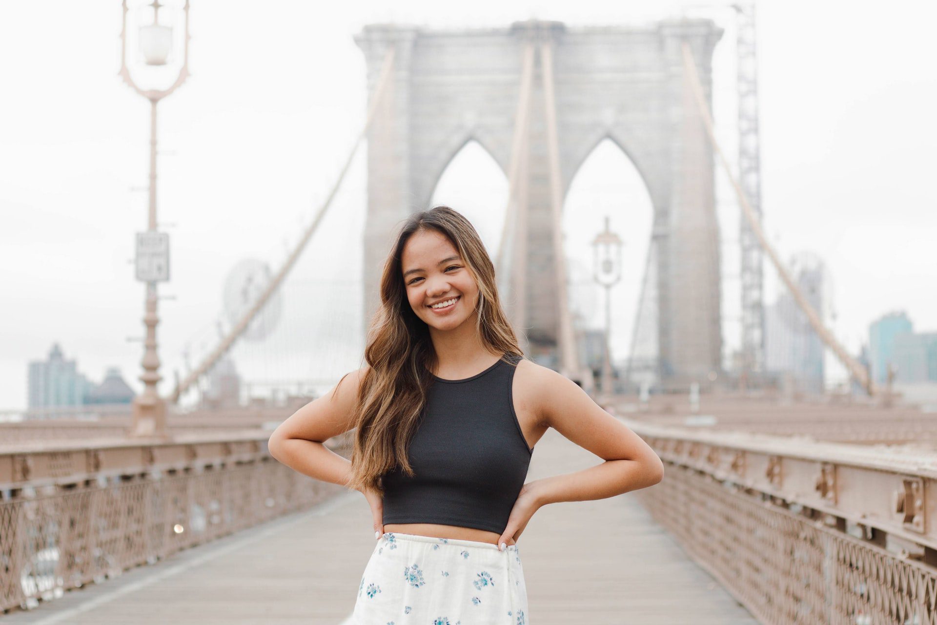 Women standing on the Brooklyn Bridge